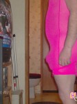 Xdresser wearing a pink dress & riding a dildo